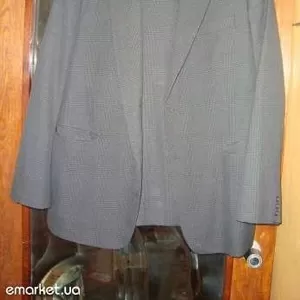 Продам костюм мужской ,  темно серый ,  размер 50-52 ,  новый 
